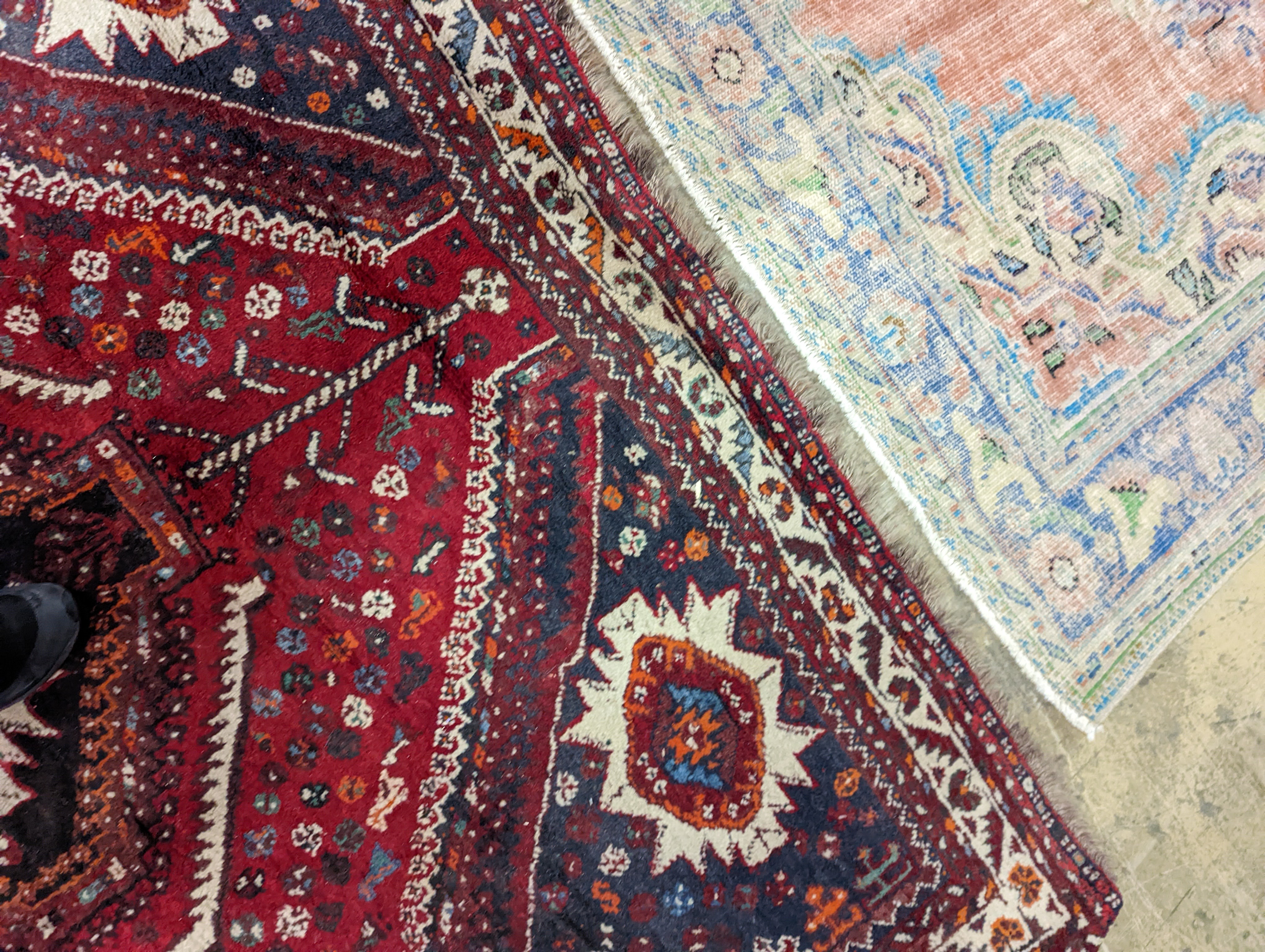 A North West Persian red ground carpet, 335 x 220cm